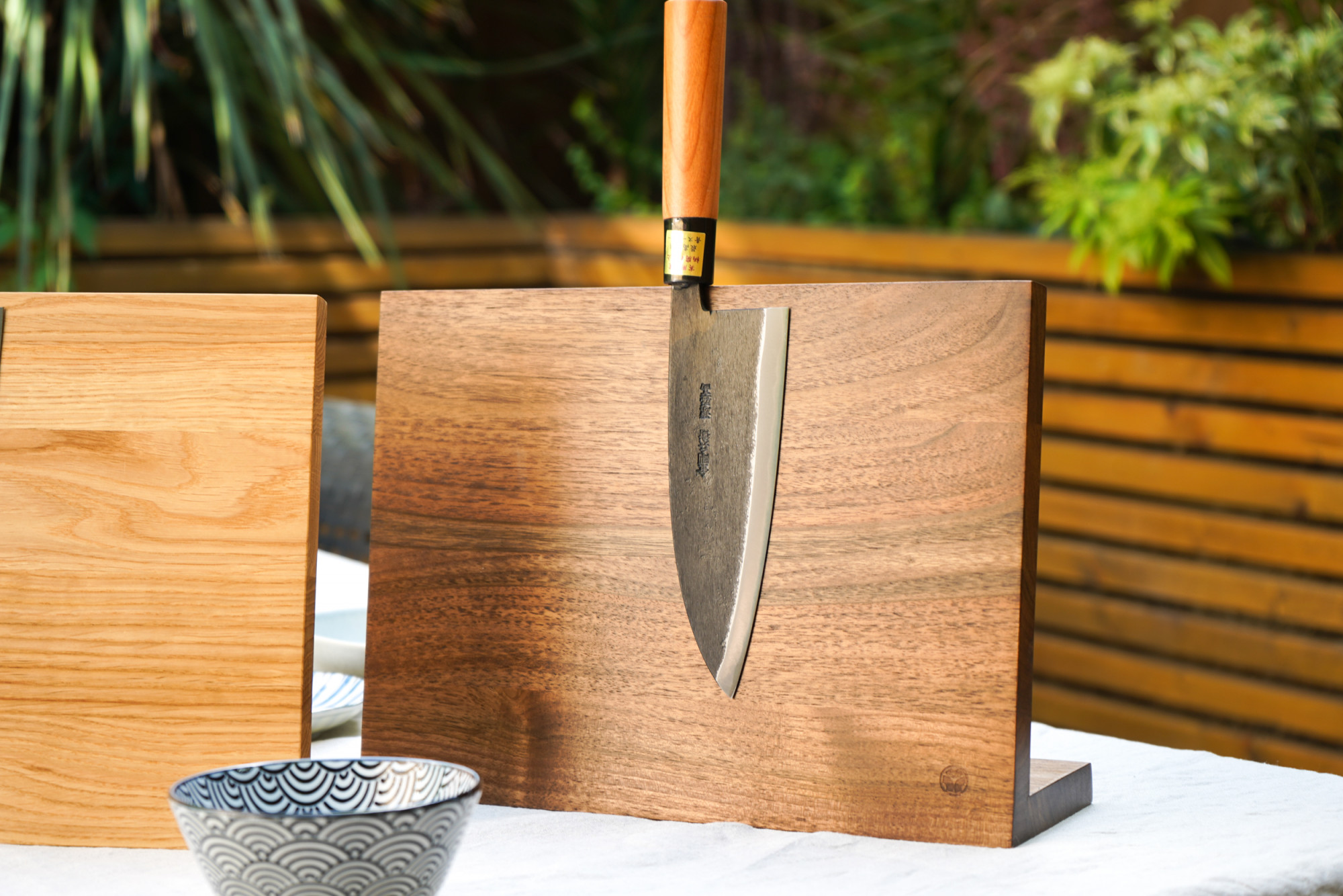 Moritaka Deba 180mm AS featuring our signature magnetic knife stand in oak