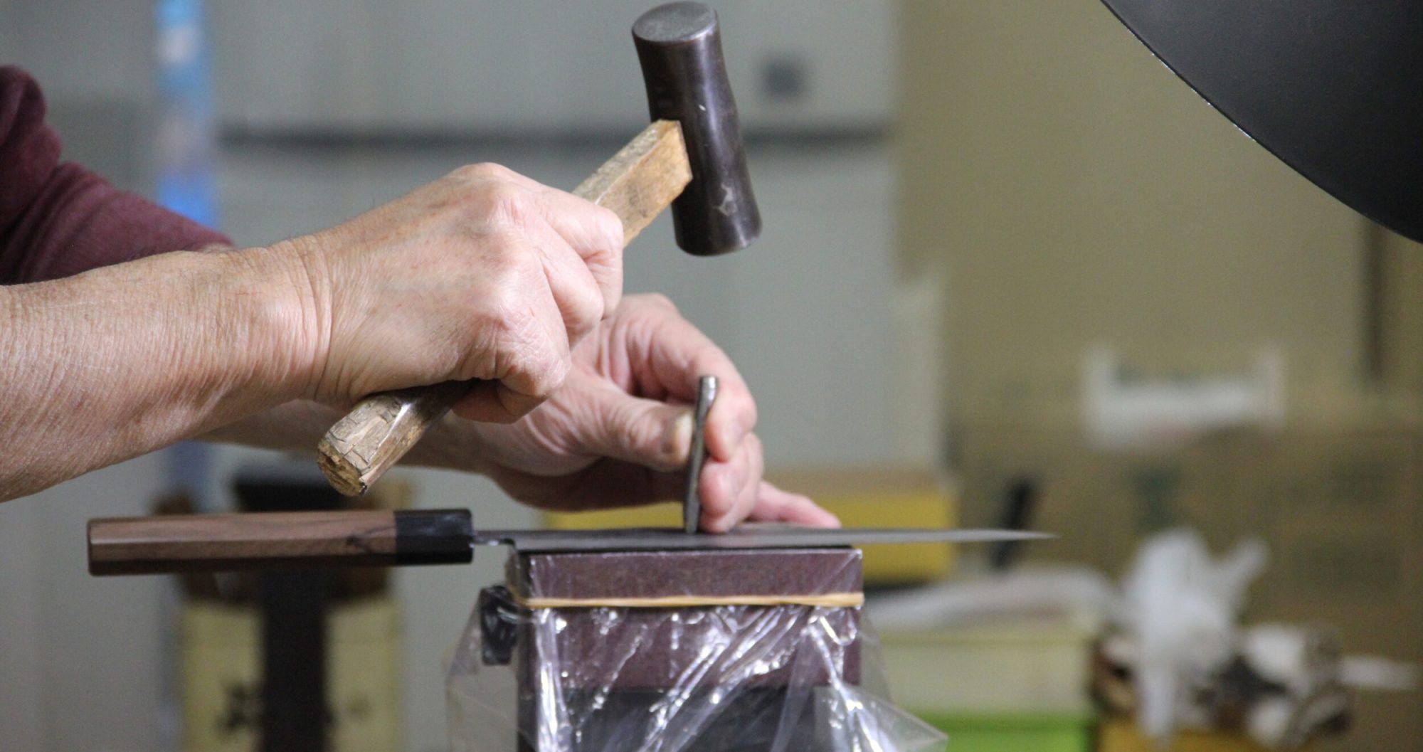 Sakai Kyuba knife making process hammering