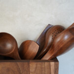 Walnut wooden utensils set close up