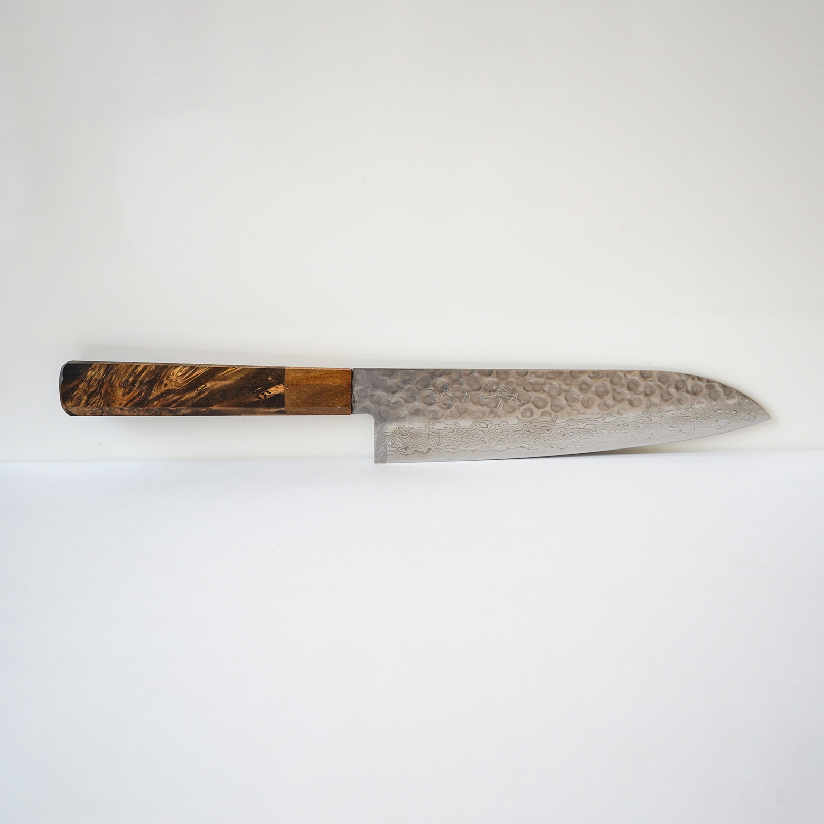 Sakai Kyuba – Chef’s Knife 19cm – The Santoku in Natural Brown handle white background