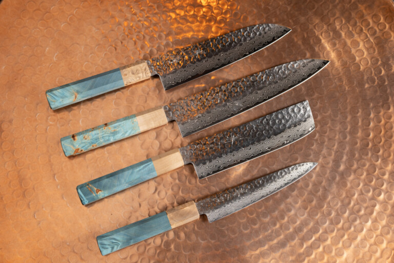 Sakai Kyuba range knives collection on table