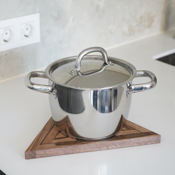 Walnut Wooden Triple Trivet Stand stacked with saucepan