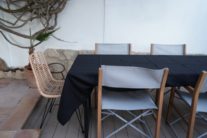 Linen Tablecloth Stonewashed – Off Black, on outdoors dining table