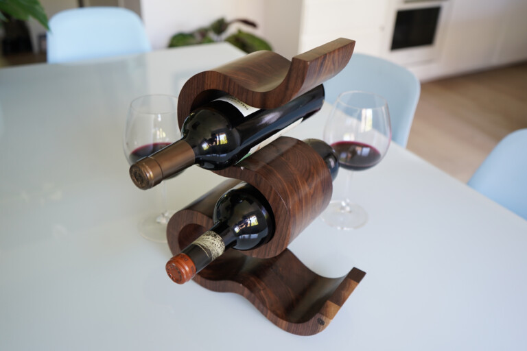Wooden Wine Rack x 5 Bottles The Wave – Walnut, on table with wine glasses