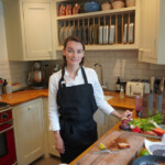 Chef Olivia Burt with Sakai Kyuba knife set in natural brown